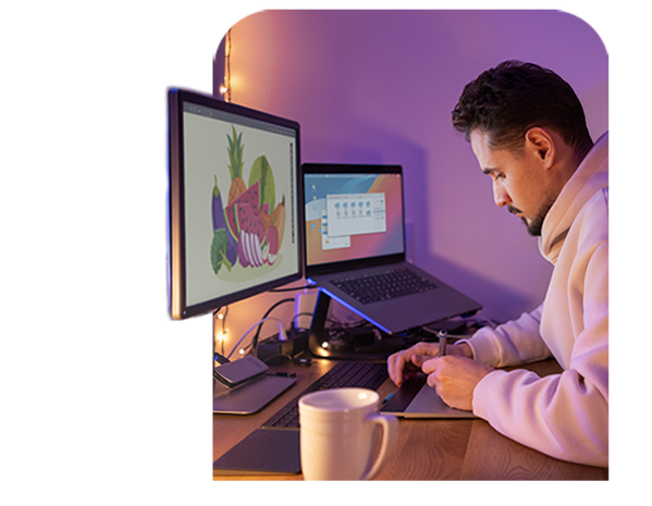 A graphic designer working on a poster.